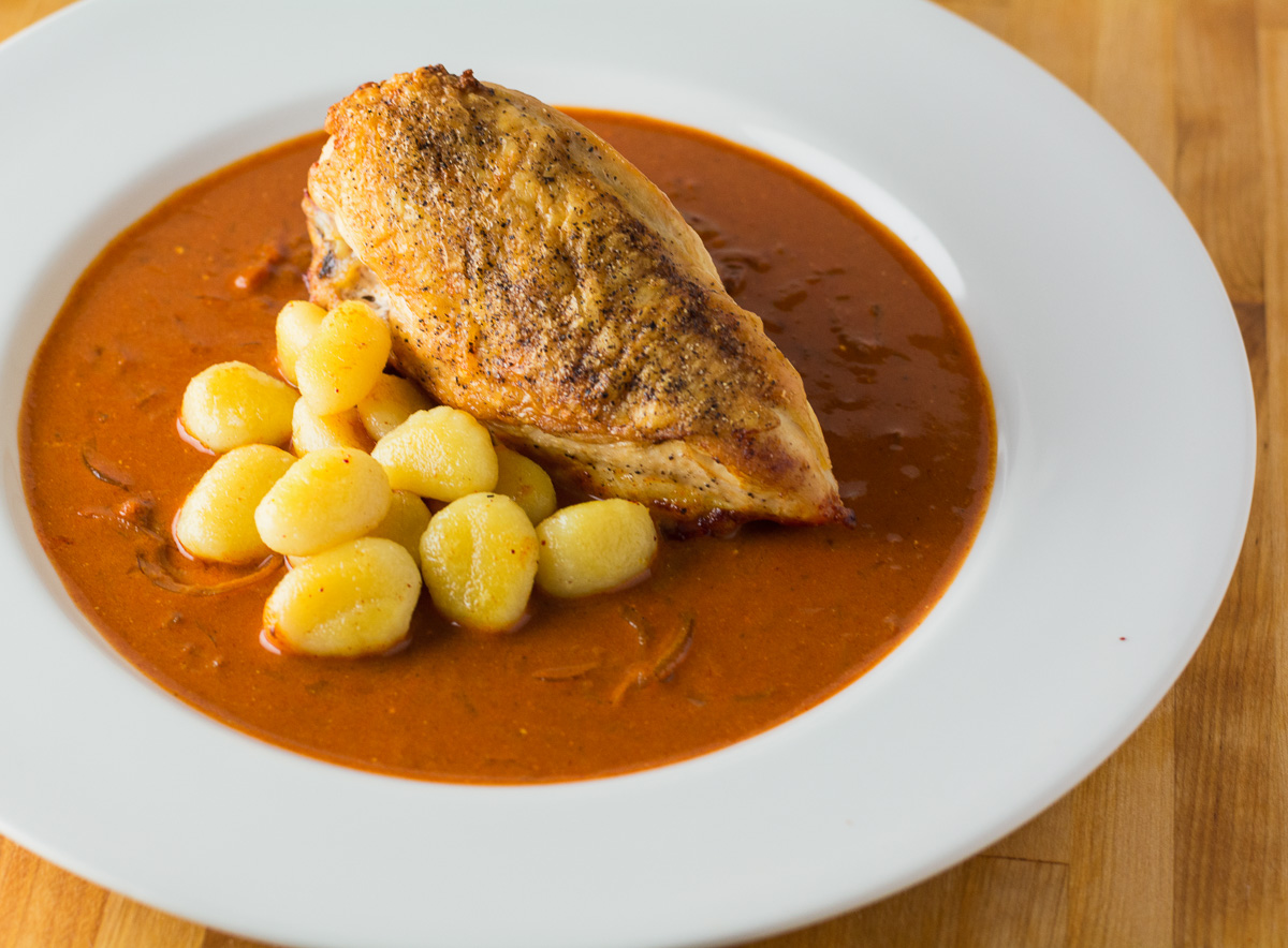 Rethink Chicken Paprikash: Crispy Skin & Braised Flavor
